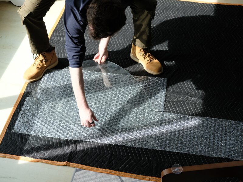 Glass being carefully wrapped